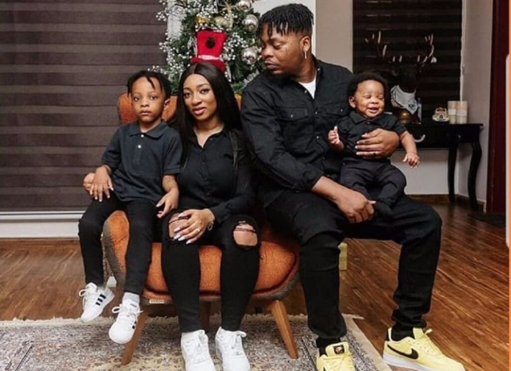 Olamide and his fiancee and two children