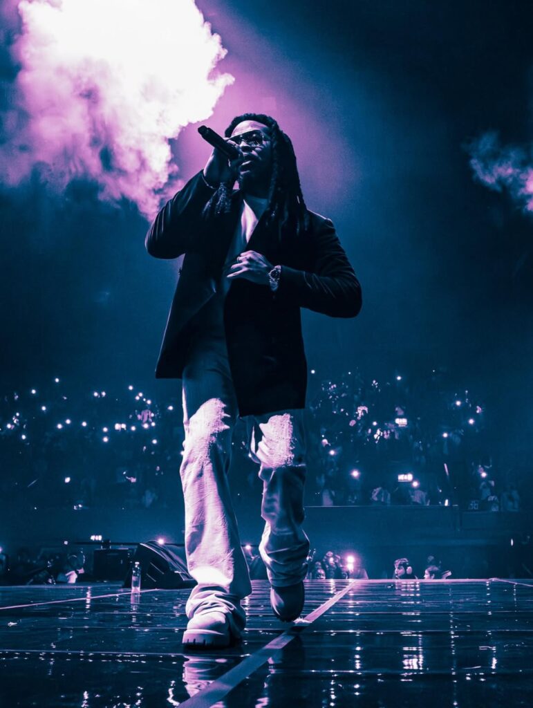 Olamide performing live at concert 2025