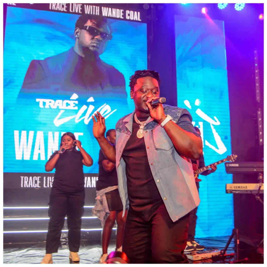 Wande Coal performing live on stage